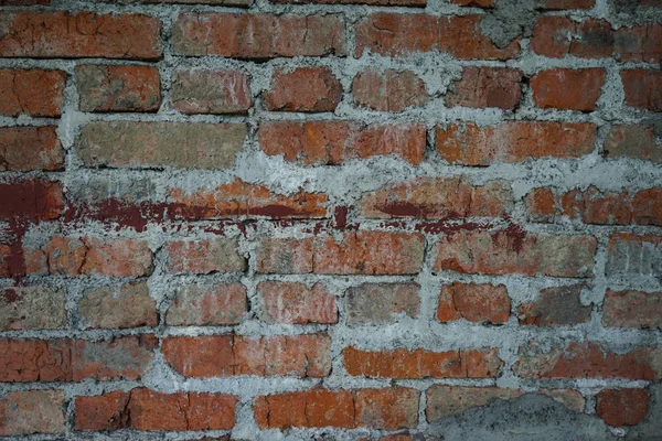 グランジ汚れた古いレンガの石の壁。暖かいレンガ造りの家の建設. — ストック写真
