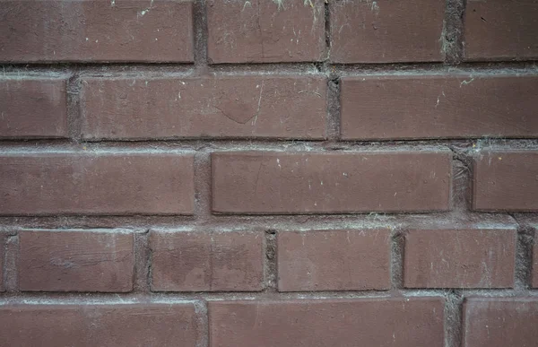 グランジ汚れた古いレンガの石の壁。暖かいレンガ造りの家の建設. — ストック写真