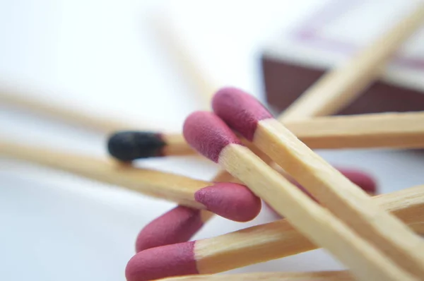 wooden matches on white background object fire