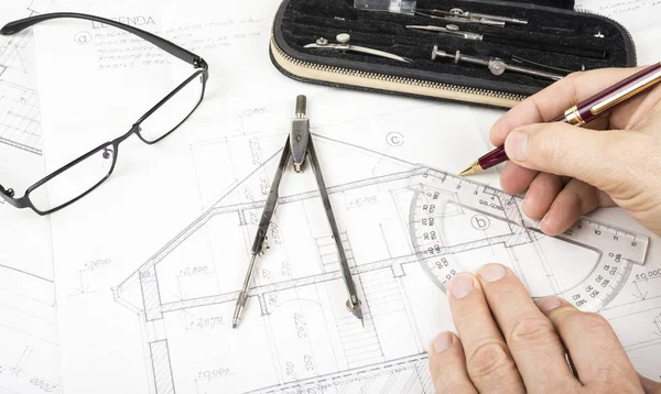 Engineer and Architect drawings blueprint at Construction Site.Home plans.
