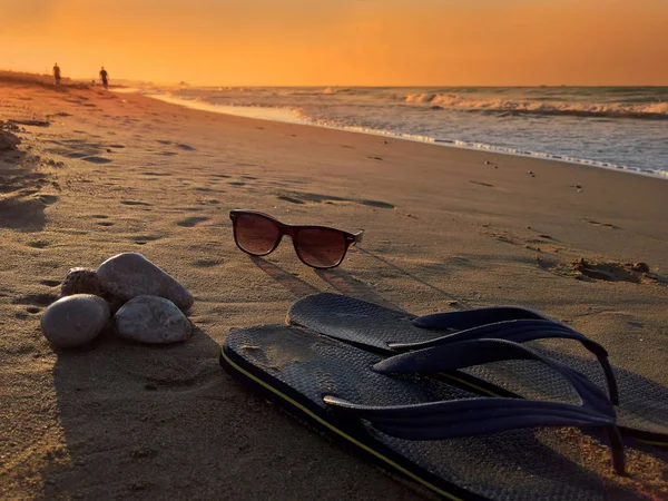 Sunglasses Slippers Shoes Beach Stones — Stock Photo, Image