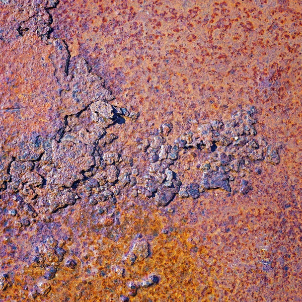 Rusty arranhado texturizado metal placa fundo. Vista de perto — Fotografia de Stock