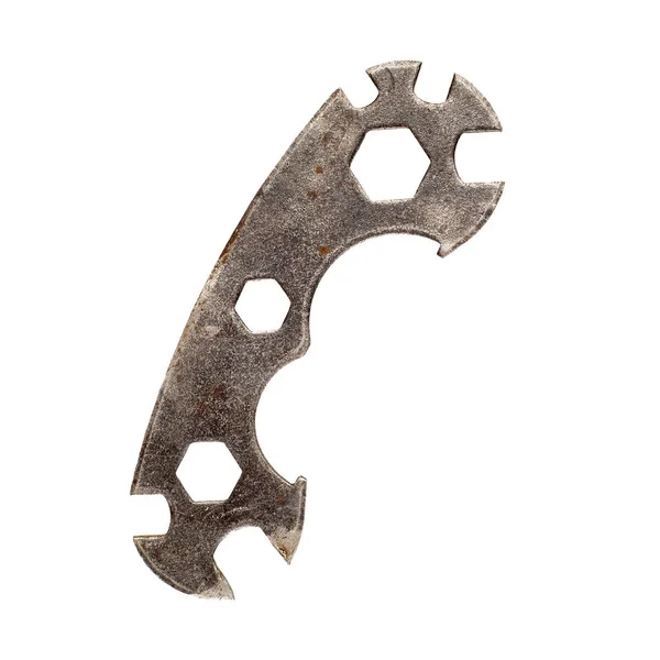 Old rusty multi function bicycle wrench hexagon. — Stock Photo, Image