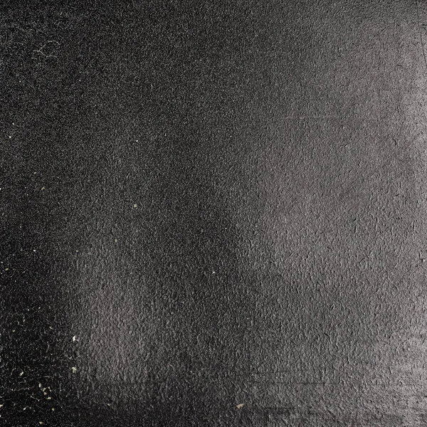 Papel preto grunge velho com descascamento de pintura de . — Fotografia de Stock
