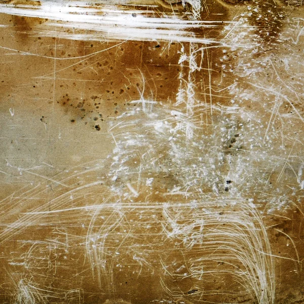 Brauner Grunge-Hintergrund mit Kratzern und Maserung. Stockfoto