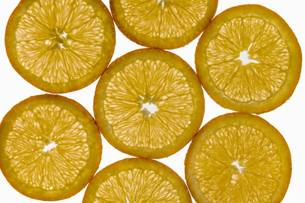 Sieben Orangenscheiben Auf Weißem Hintergrund — Stockfoto