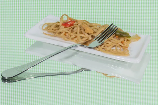 Concept of healthy food. Italian pasta served on a white plate w — Stock Photo, Image