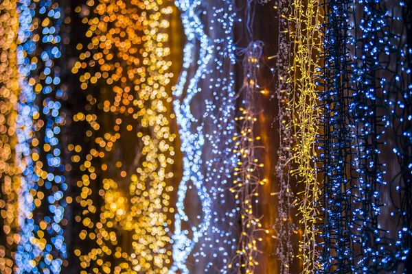 Hermosa Guirnalda Con Pequeñas Luces Tonificación Naranja Azul Concepto Navidad — Foto de Stock