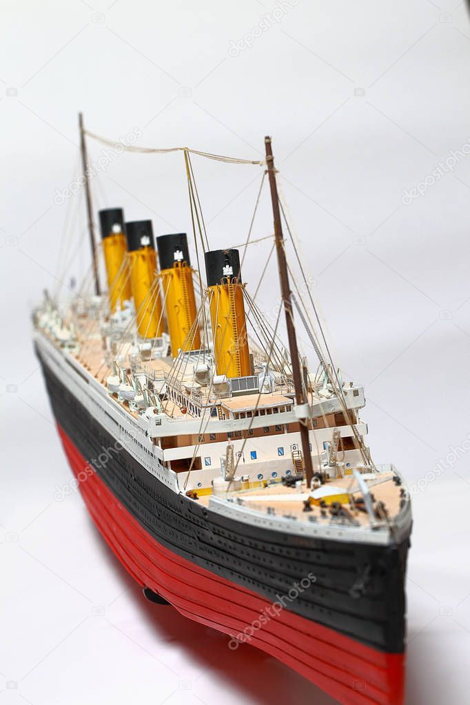 Handmade model of Titanic. Beautiful Handmade model of Titanic isolated on white background.