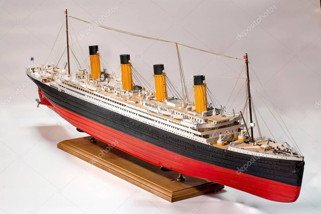 Handmade model of Titanic. Beautiful Handmade model of Titanic isolated on white background.