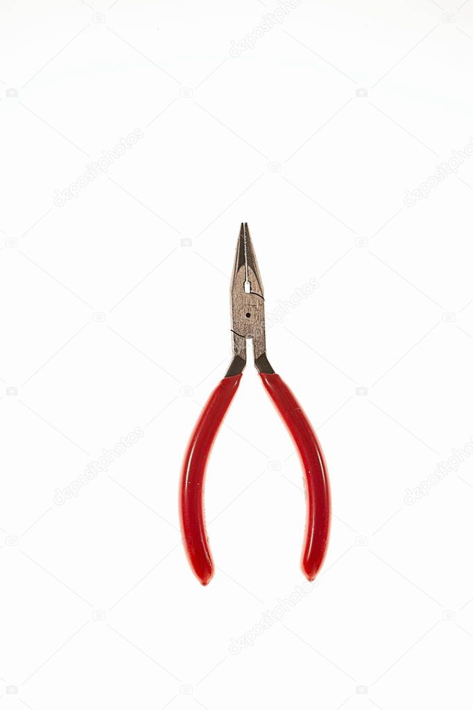 Beautiful hobby snipe-nose pliers isolated on white background. Tools for hobby. Free time / interest concept.