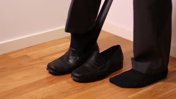 Man Black Trousers Putting Black Shoes People Backgrounds — Stock Video