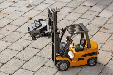 Radyo görünümünü modeli forklift kontrol. Serbest zaman çocuklar ve yetişkinler kavramı. Hobi. Oyuncaklar. 