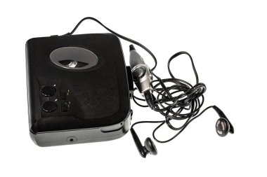 Ses çalar ve yalıtılmış kulaklıklar görünümü yakın. Eski teknoloji arka planlar.