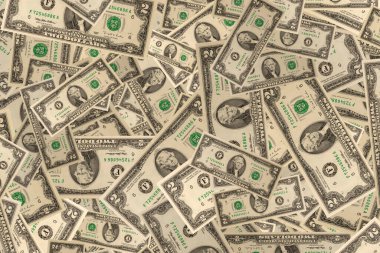 Yüzeyde duran iki dolarlık banknotların yakın görüntüsü. Banknotlar. Para kavramı geçmişi.