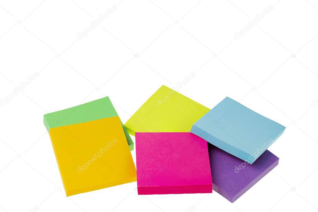 Close up view of colorful post note isolated on white background.