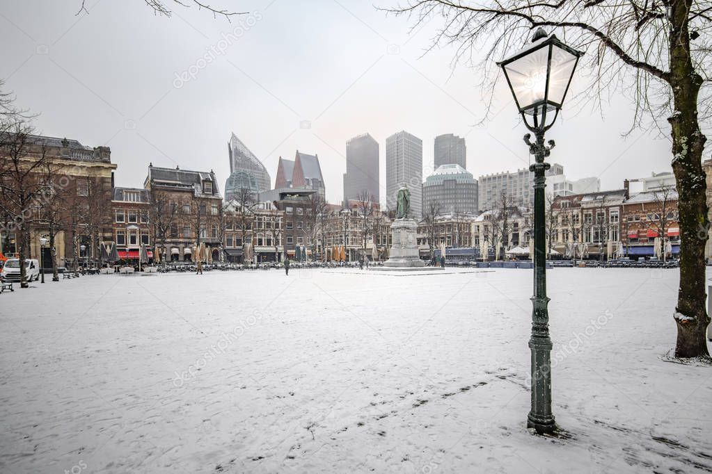 THE HAGUE, 22 January 2019 -  Snow on the central place, Spui in Dutch, usually crowded with people getting diner and drink during the sunset and warm autumn weather in The Hague, Netherlands
