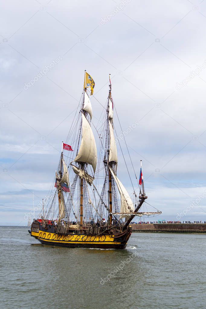 SCHEVENINGEN,  20 June 2019 - Tall ship Shtandart, Russian ship entering in the Scheveningen harbor for the Liberty Tall Ships Regatta in The Hague, Netherlands