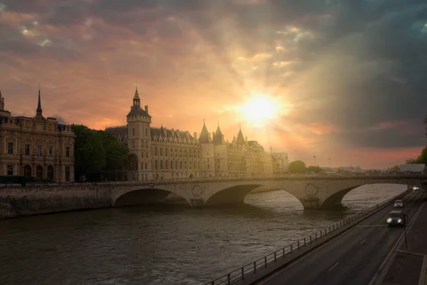 Romantic of Paris center city on the Seine river during the warm orange color sunset, France