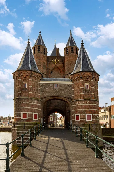 Medieval Haarlem city entry gate above the canal with its bridge and gate keeper towers