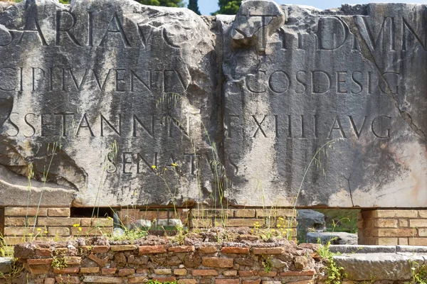 Fragment of old inscription on stone. Forum Romanum. Rome. — Stock Photo, Image
