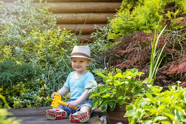 Cute Little Baby Boy Playing Yellow Baby Rake Sitting Garden — Stock Photo, Image