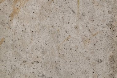 Taş dokusu, katılaşmış beton, gri ve bej noktalar siyah noktalar ile yüzeyi.
