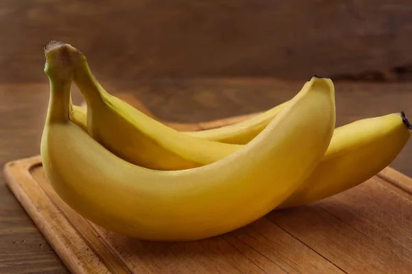 Bananas Peel Wooden Chopping Board — Stock Photo, Image