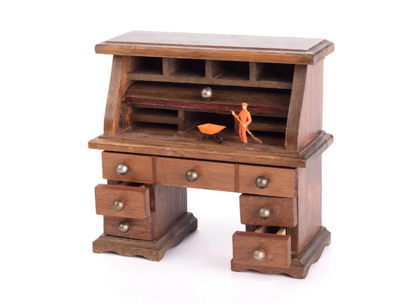 Small vintage wooden desk, small man cleaning - Clean desk policy