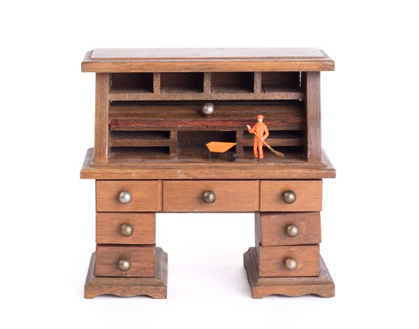 Small vintage wooden desk, small man cleaning - Clean desk policy