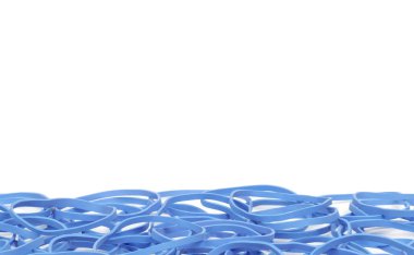 Beyaz arkaplanda küçük lastik bantları kapat