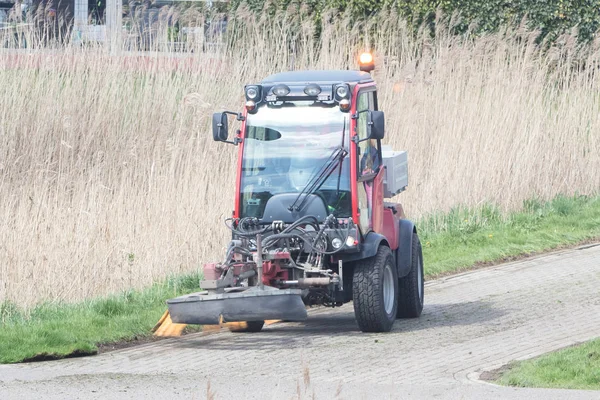 Street sweeper machine cleaning the streets - The Netherlands