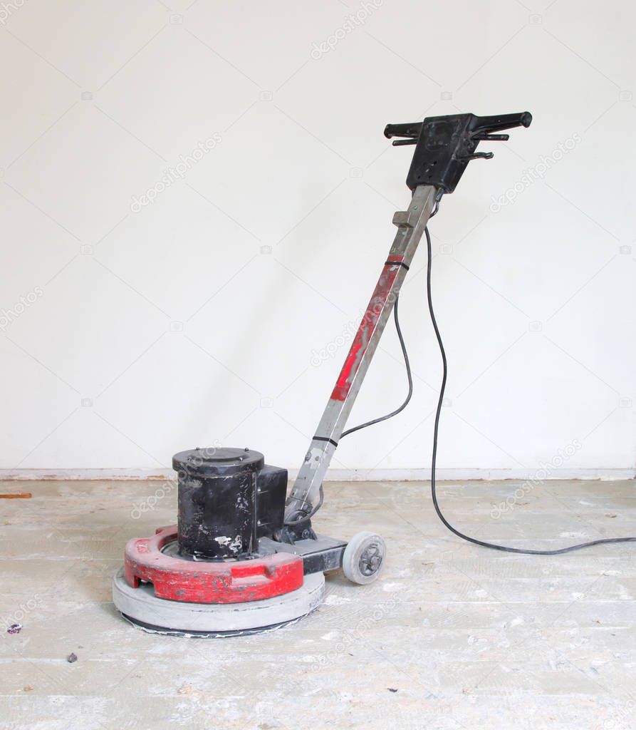 Construction business concept : Concrete surface sanding machine : Workers use concrete sanding machine to smooth the cement floor.