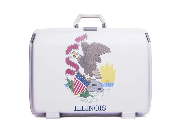 Used plastic suitcase with stains and scratches, printed with flag, Illinois