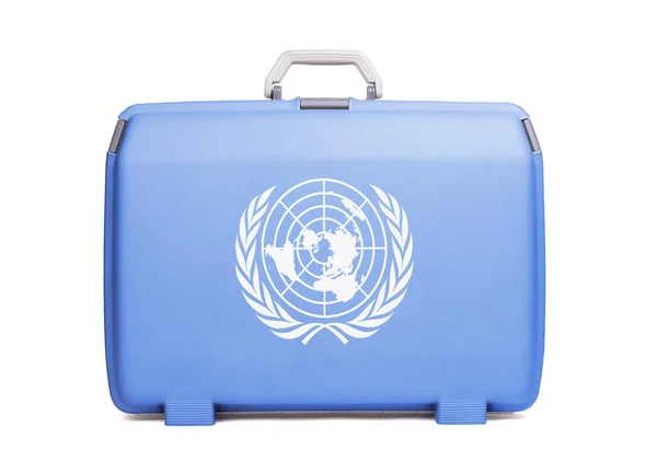 使用塑料手提箱污渍和划痕 印着联合国的旗帜 — 图库照片