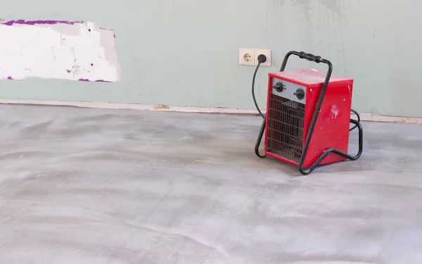 Riscaldatore Rosso Compatto Asciugando Pavimento Prima Installare Pavimento Pvc — Foto Stock