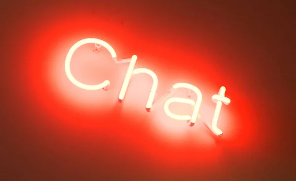 Neon Sign Shining White Wall Chat — Stock Photo, Image