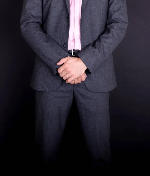 Businessman Standing Hands Folded Grey Suit — Stock Photo, Image