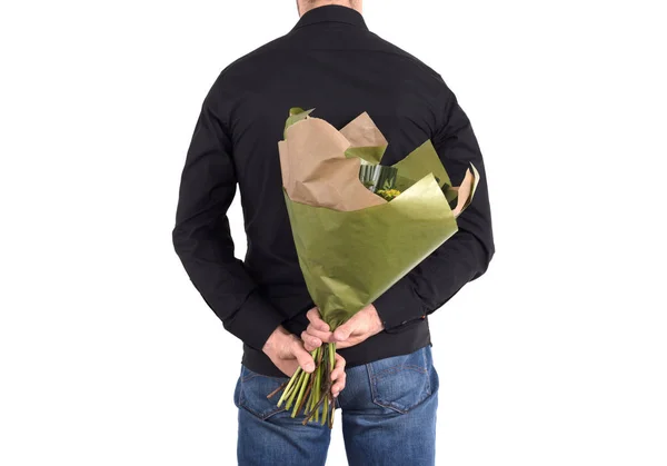 Mens Verbergt Bloemen Achter Zijn Rug Geïsoleerd — Stockfoto