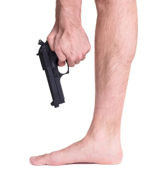 Man shooting himself in the foot — Stock Photo, Image