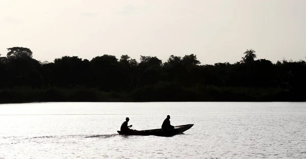 Silhouette Small Boat River Gambia – stockfoto