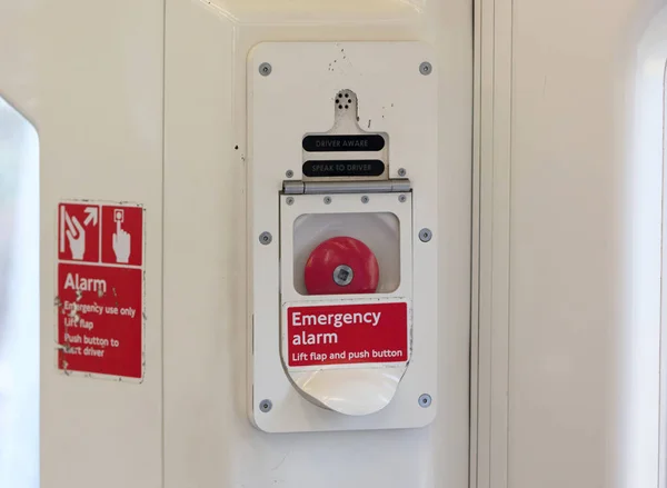 Emergency alarm button, London metro