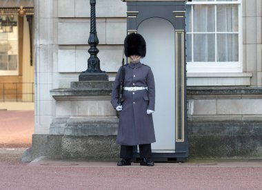 London, United Kingdom - Februari 21, 2019 : Guards in greatcoat clipart