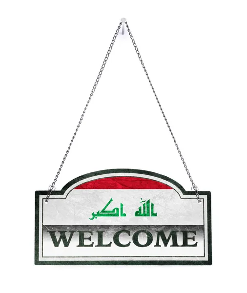 Iraq welcomes you! Old metal sign isolated — Stock Photo, Image