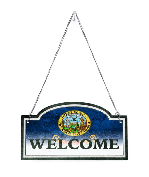 Idaho welcomes you! Old metal sign isolated — Stock Photo, Image