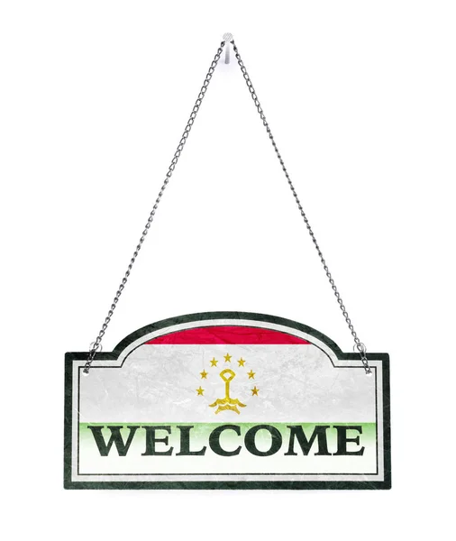 Tajikistan welcomes you! Old metal sign isolated — Stock Photo, Image