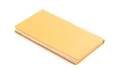 Kapalı eski sarı kitap izole