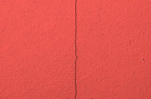 Fragment d'un vieux mur fissuré rouge — Photo