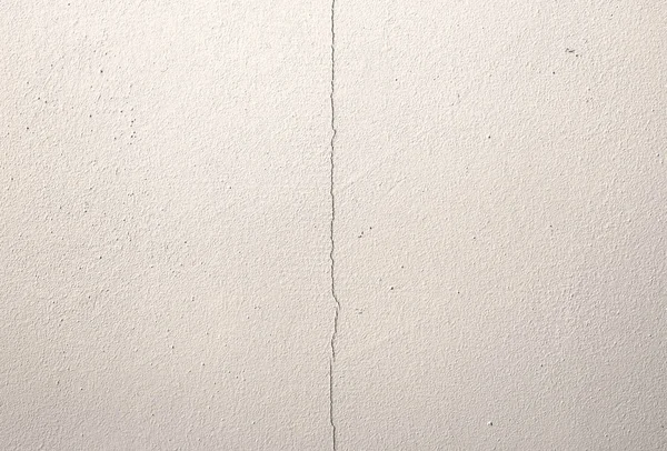 Fragment of an old white cracked wall — Stock Photo, Image