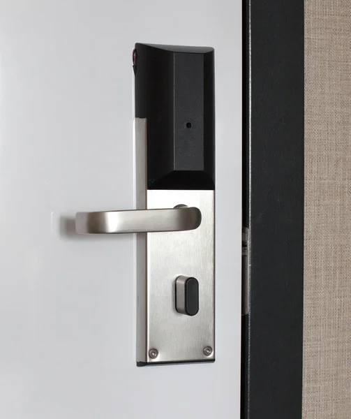 Hotel door with automatic lock for visitor card